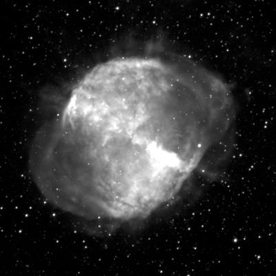 A large, spherical cloud in shades of grey with lots of bright white areas. The cloud is in the middle against a black background with some small, white dots of stars.